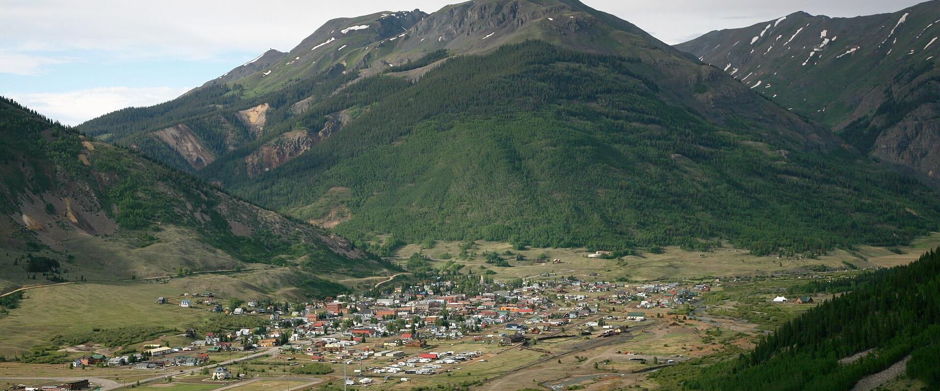 Silverton, Colorado, in its valley beneath the San Juan Mountains, seen from US 550