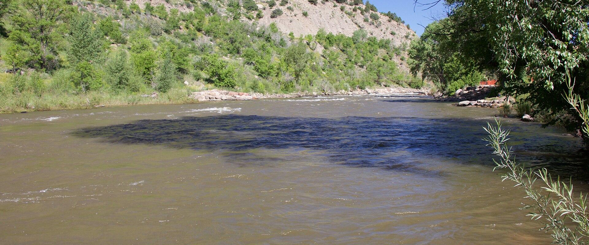 The Animas River flowing through Durango beside the riverside trail