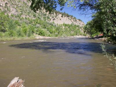 The Animas River flowing through Durango beside the riverside trail