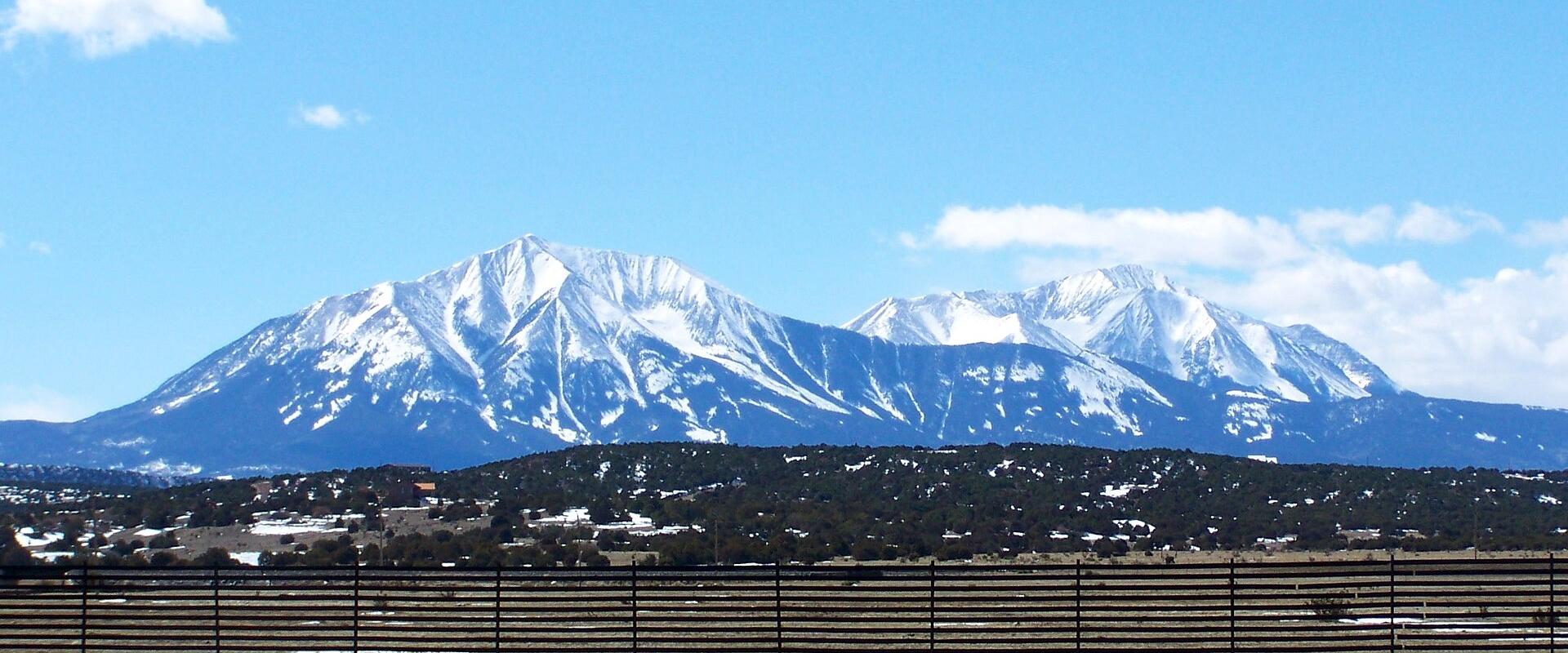 The snow-capped Spanish Peaks rising above the plains of southeastern Colorado