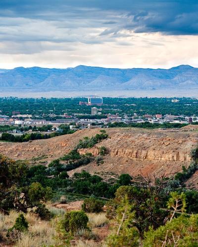 Panoramic view over Grand Junction with the Book Cliffs and Grand Mesa country beyond