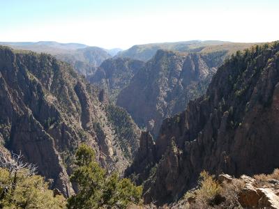 Sheer dark walls of the Black Canyon of the Gunnison seen from Tomichi Point on the South Rim
